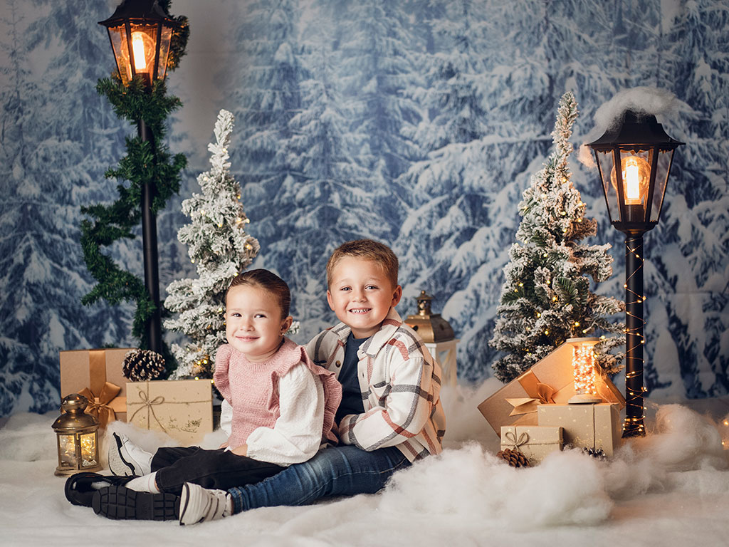 Niños disfrutando de mini sesion de Navidad